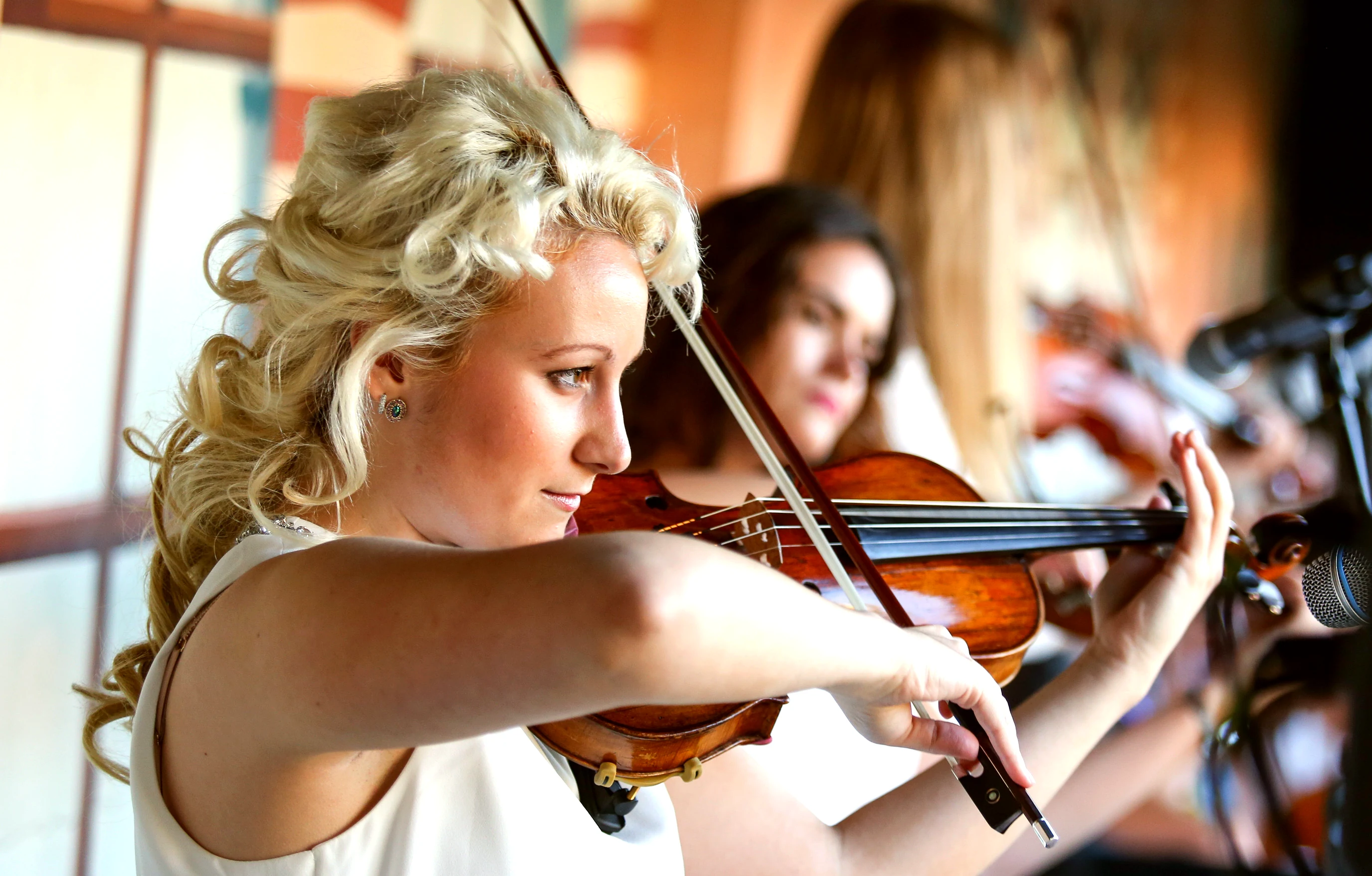 String quartet wedding hire — violinists performing at a London venue